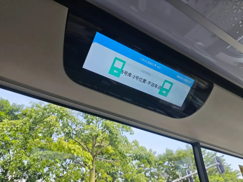 Digital screen displaying bus route information, illustrating responding constructively to reviews